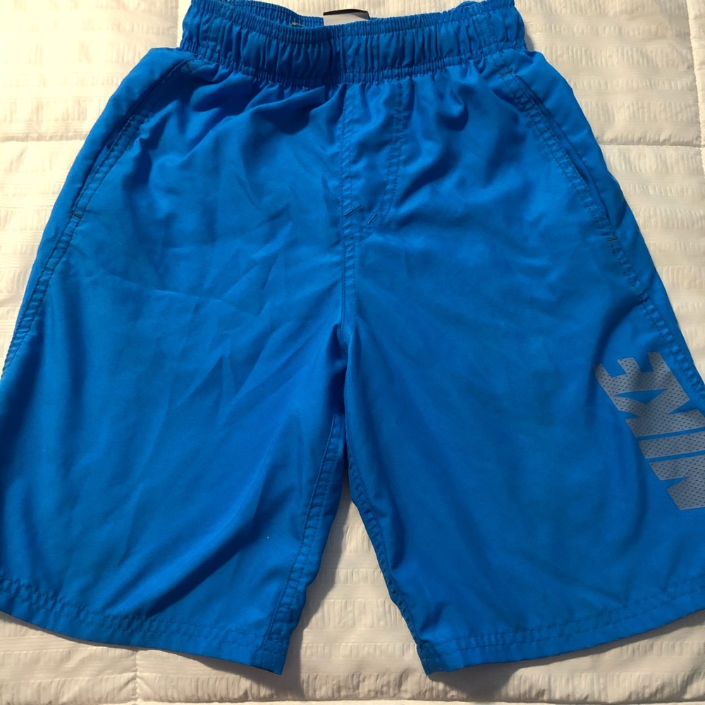 Like NEW! Boys size Small Nike swim trunks.